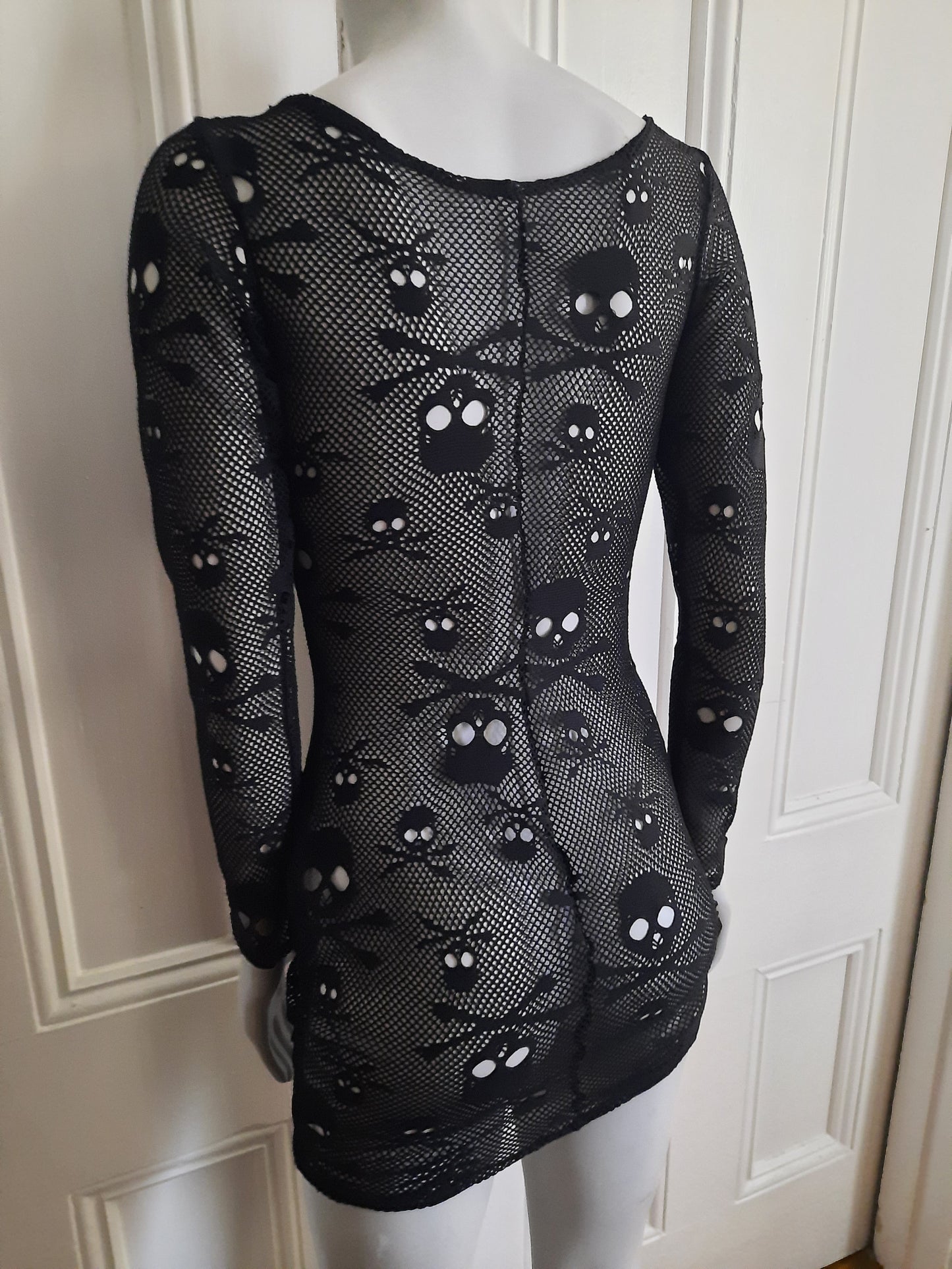 Long sleeve black skull Fishnet body con mini dress